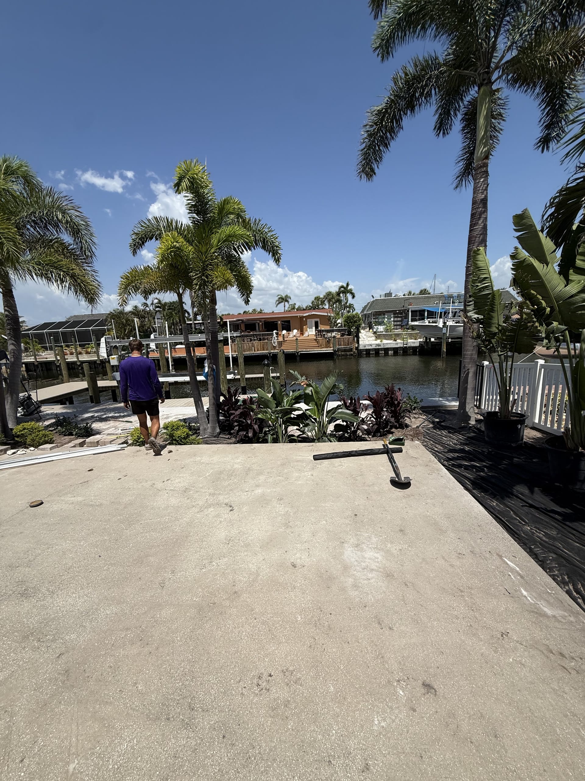 Finished waterfront patio and seating area at handoff